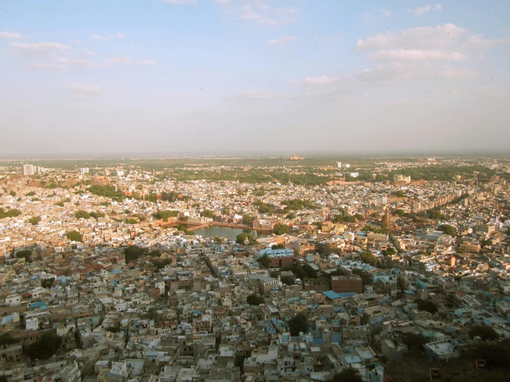 an aerial view of a city with lots of buildings, flickr, hurufiyya, indian temple, high res photograph, fan favorite, a hyper realistic