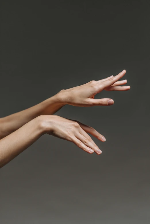 a woman reaching out to catch a frisbee, by Nina Hamnett, visual art, single pair of hands, square, synthetic bio skin, no - text no - logo