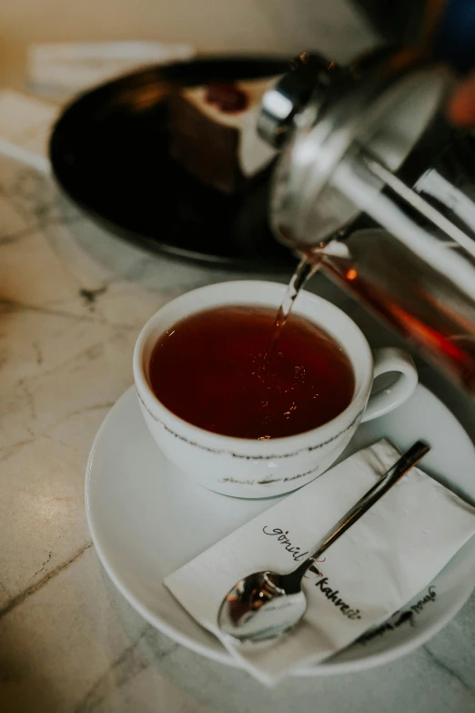 a person pouring tea into a cup on a plate, by Sebastian Vrancx, pexels contest winner, renaissance, inside a french cafe, thumbnail, background image, soup