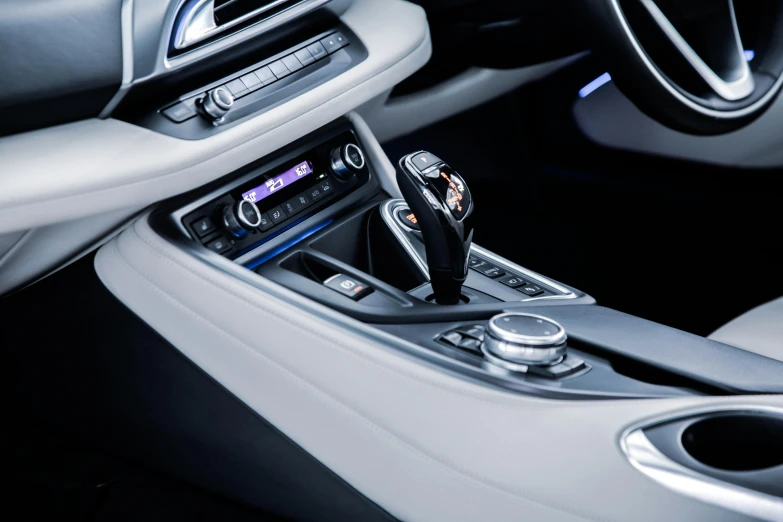 a close up of the center console of a car, inspired by An Gyeon, les automatistes, bmw i 8, thumbnail, chromatic