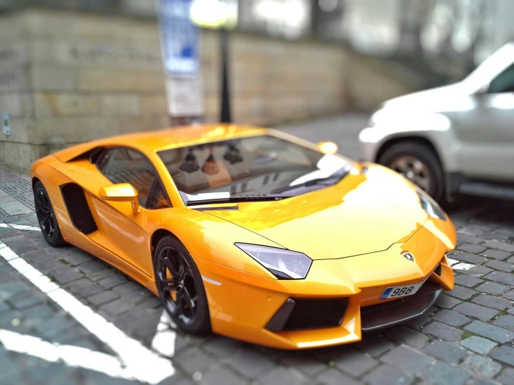 a close up of a toy car on a street, by Adam Marczyński, pexels contest winner, hyperrealism, lamborghini, real life size, high detail!!! 8 k, orange tint