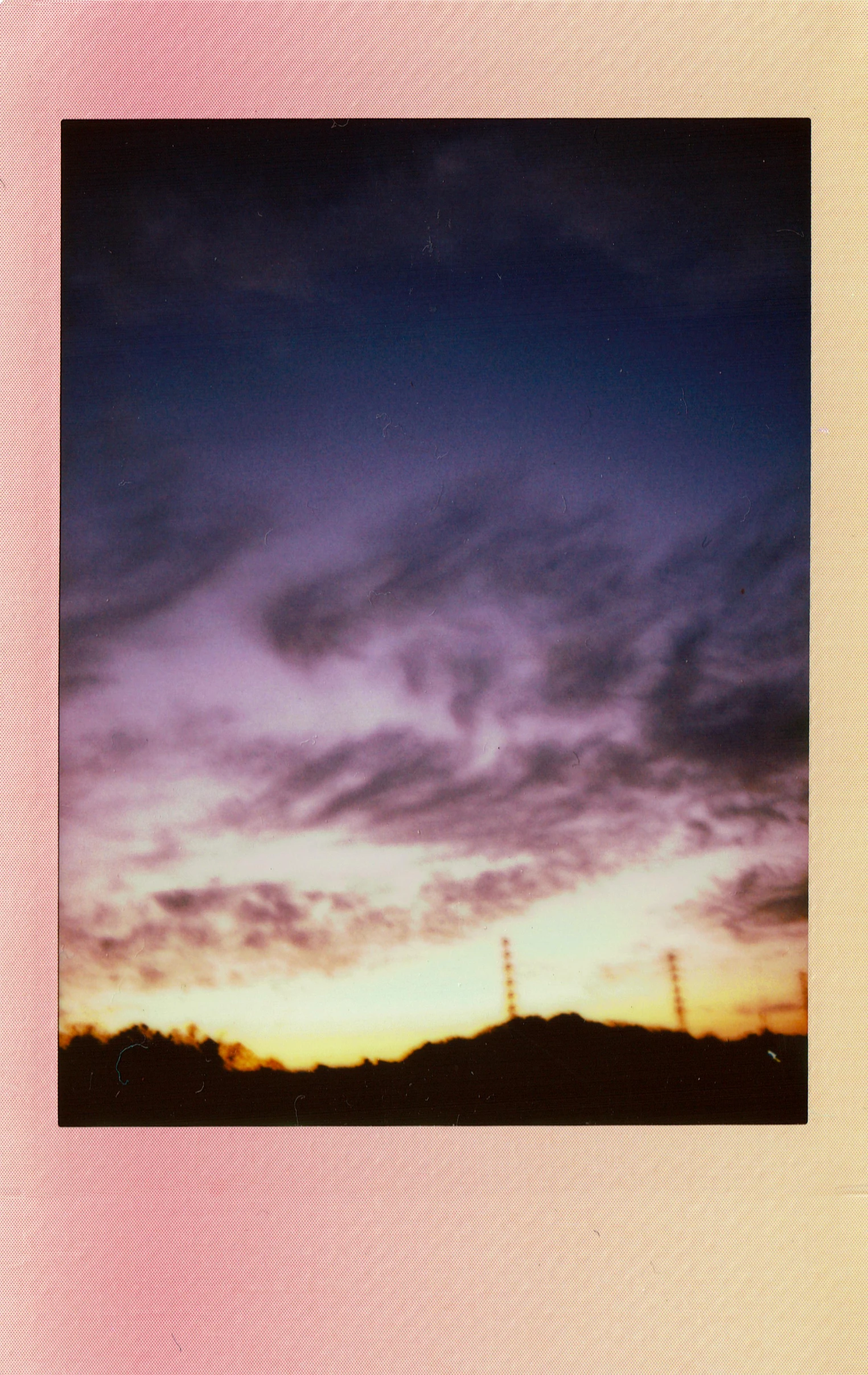 a picture of a sunset with clouds in the sky, a polaroid photo, color field, ( ( risograph ) ), instax, sky line, 35mm —w 1920 —h 1080