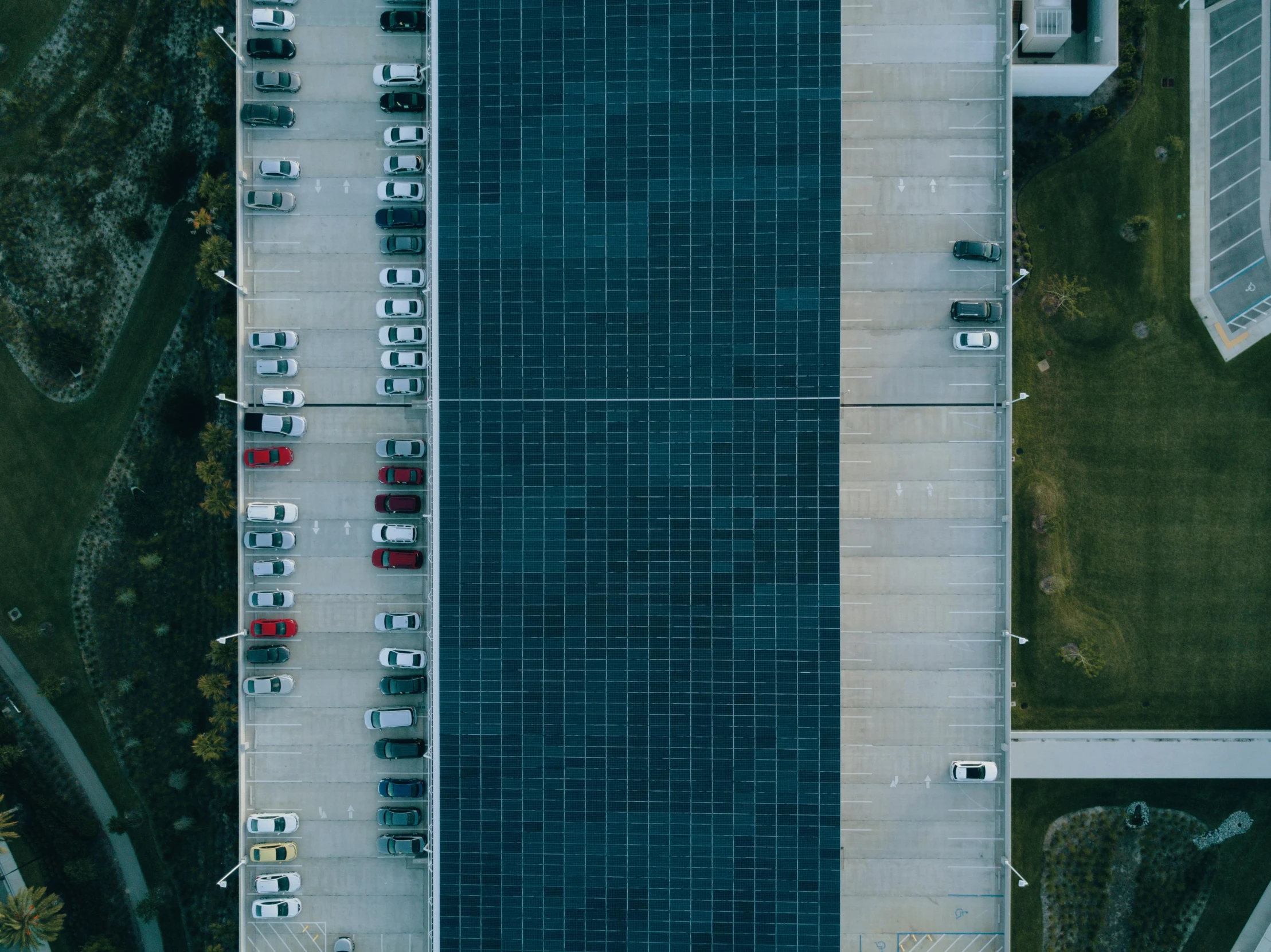 a parking lot filled with lots of parked cars, a photo, by Carey Morris, unsplash contest winner, renaissance, solar panels, ignant, graphic print, square