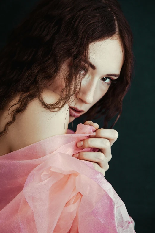 a woman in a pink dress posing for a picture, an album cover, by Lucia Peka, trending on pexels, renaissance, young sensual woman, curls, soft translucent fabric folds, close-up shoot