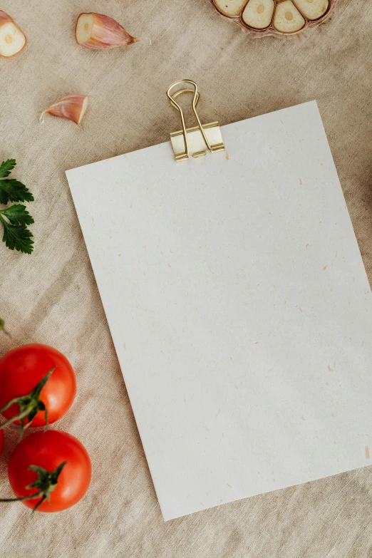 a piece of paper sitting on top of a table, pexels contest winner, tomatoes, tall thin frame, thumbnail, linen