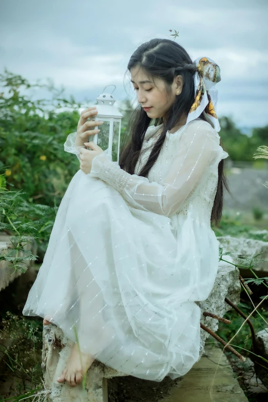 a woman in a white dress holding a glass of water, a picture, inspired by Tang Yifen, unsplash, magical realism, girl under lantern, fairycore, pose 4 of 1 6, ruan cute vtuber