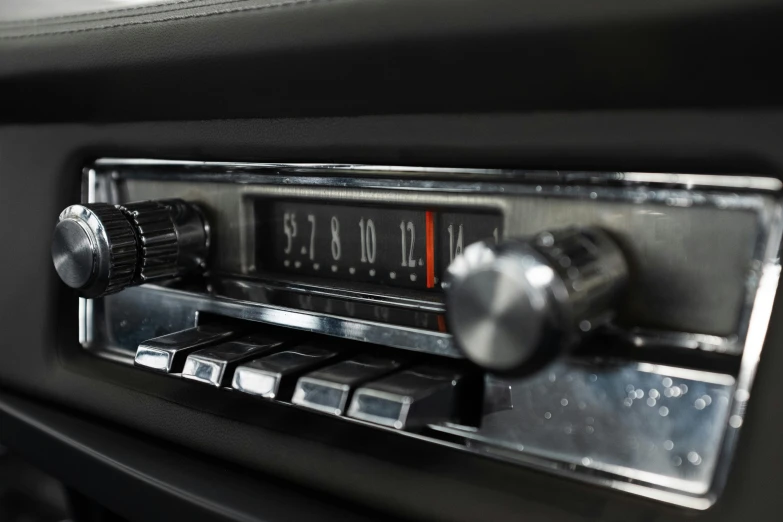 a close up of a radio in a car, 1960s style, mercedes, high res photograph, rectangle