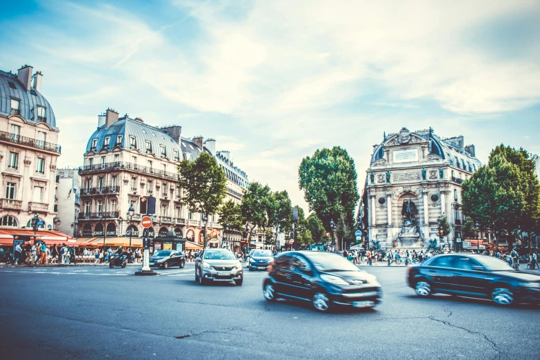 a street filled with lots of traffic next to tall buildings, a photo, pexels contest winner, paris school, on a great neoclassical square, floating cars, 🚿🗝📝