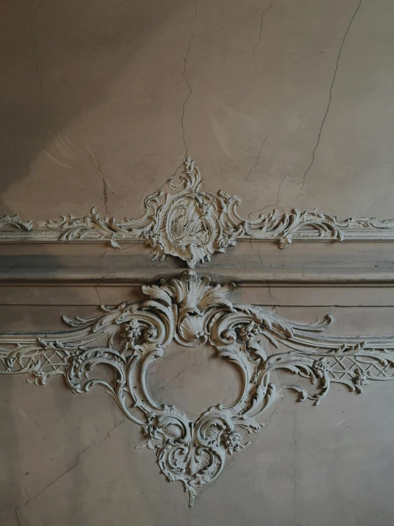 a close up of a decorative design on a wall, an album cover, unsplash, rococo, ceilings, detailed clay model, snapchat photo, restoration