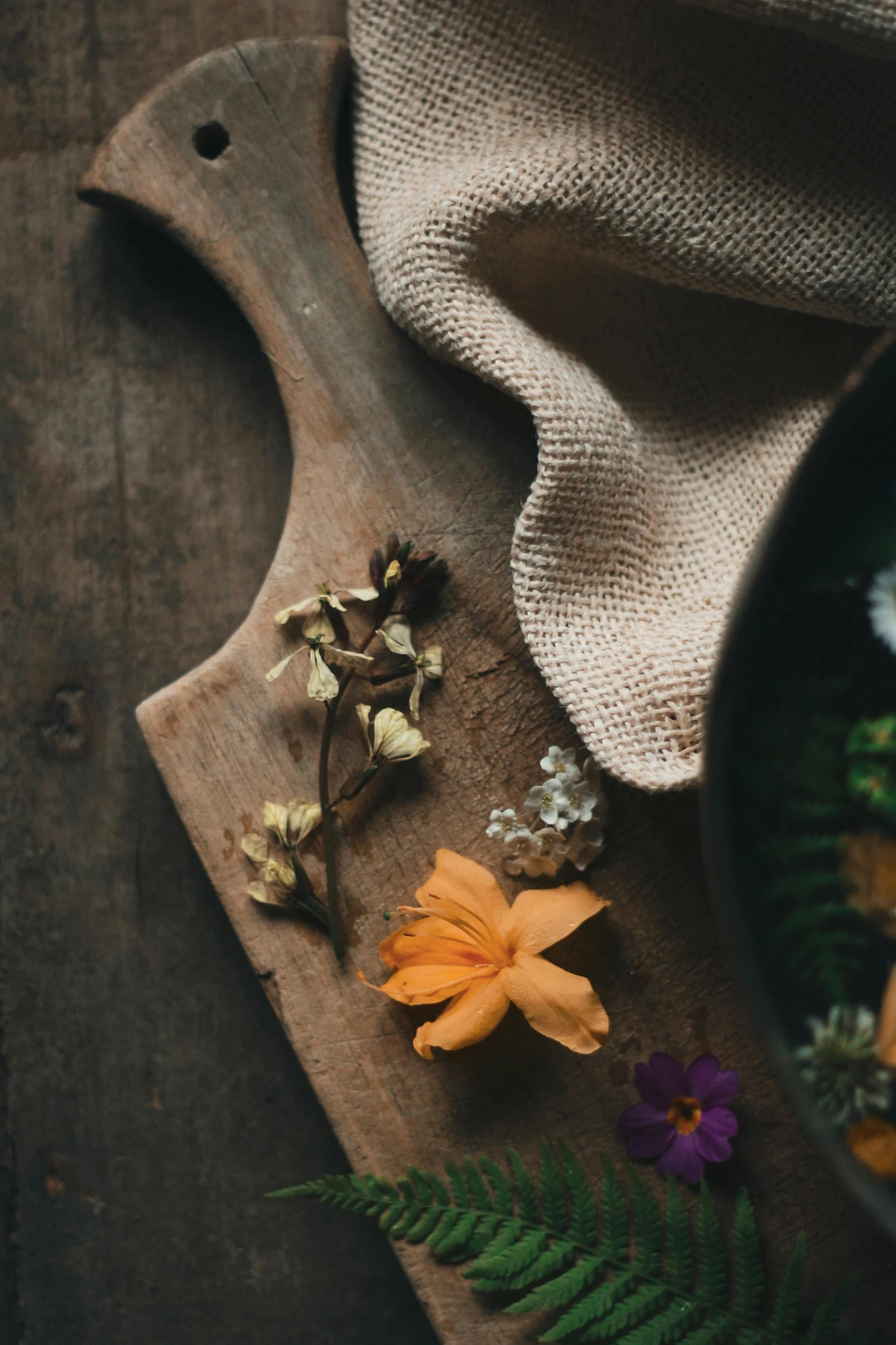 a plate of food sitting on top of a wooden table, a still life, trending on unsplash, renaissance, made of flowers, textured canvas, herbs, ((still life))