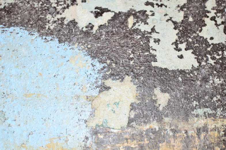 a close up of peeling paint on a wall, inspired by Richter, unsplash, concrete art, pale cyan and grey fabric, moist brown carpet, blue paint on top, floor tiles