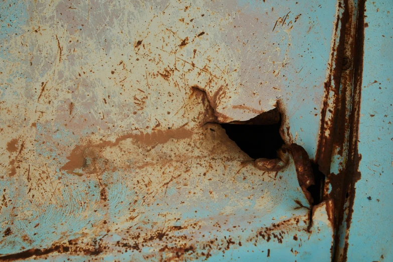 a rusted metal door with a hole in it, an album cover, by Elsa Bleda, unsplash, auto-destructive art, brown and cyan blue color scheme, ignant, poop, square