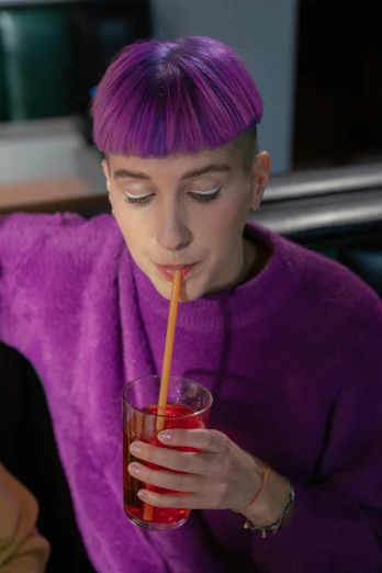 a woman with purple hair drinking a drink, trending on pexels, hyperrealism, androgynous male, jackstraws, corduroy, shaved head