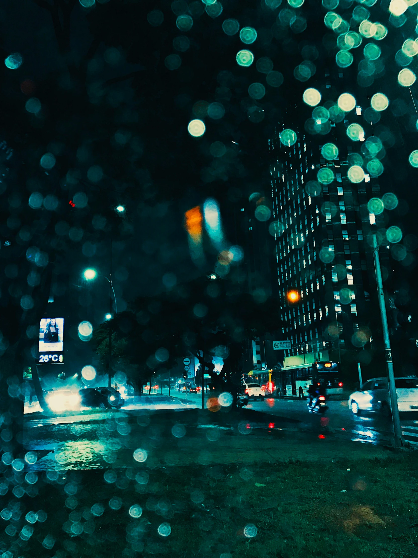 a city street filled with lots of traffic at night, a picture, inspired by Elsa Bleda, hyperrealism, raindrops, gif