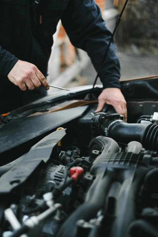 a man working on a car engine, pexels contest winner, a man wearing a black jacket, emergency, organic detail, ilustration