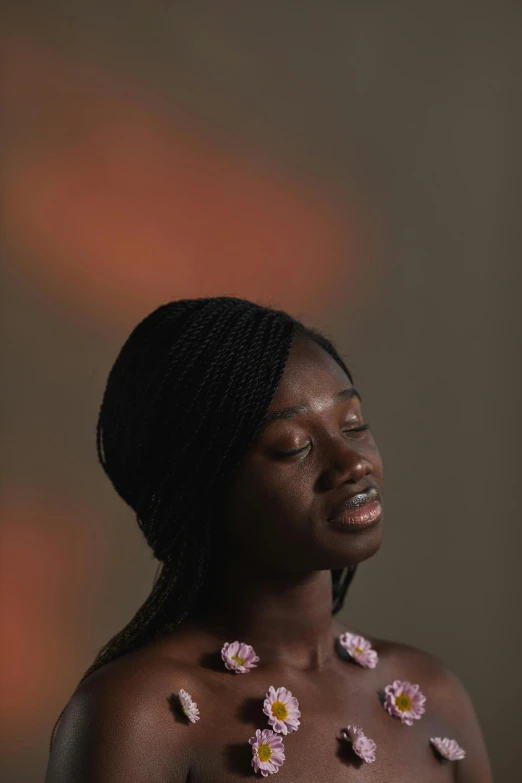 a woman with flowers on her chest, an album cover, by Stokely Webster, unsplash, happening, adut akech, light falling on face, photographed for reuters, black teenage girl