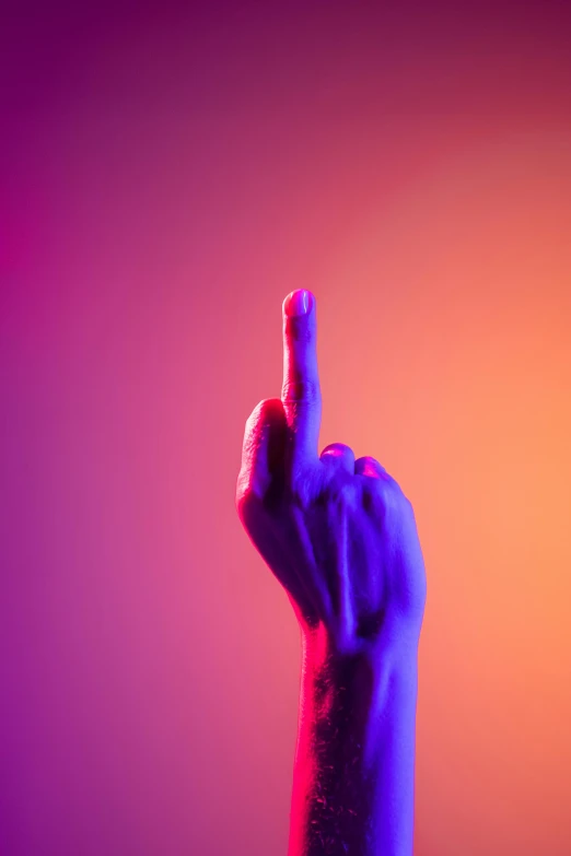 a close up of a person's hand with a finger up, by Adam Marczyński, synchromism, purple orange colors, (neon colors), promo image, single