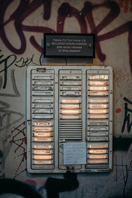 a close up of a wall with graffiti on it, an album cover, control panel, lights inside, government archive, kreuzberg