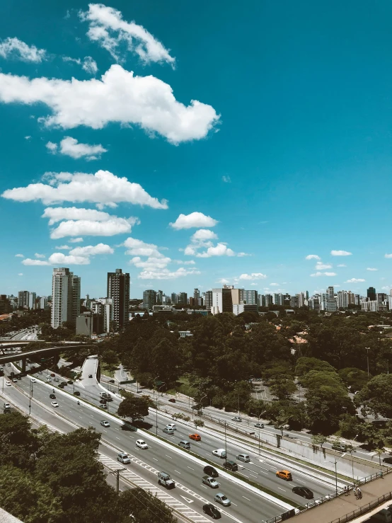a view of a city from the top of a building, by Ceferí Olivé, 🚿🗝📝, edu souza, bright summer day, 8k photo