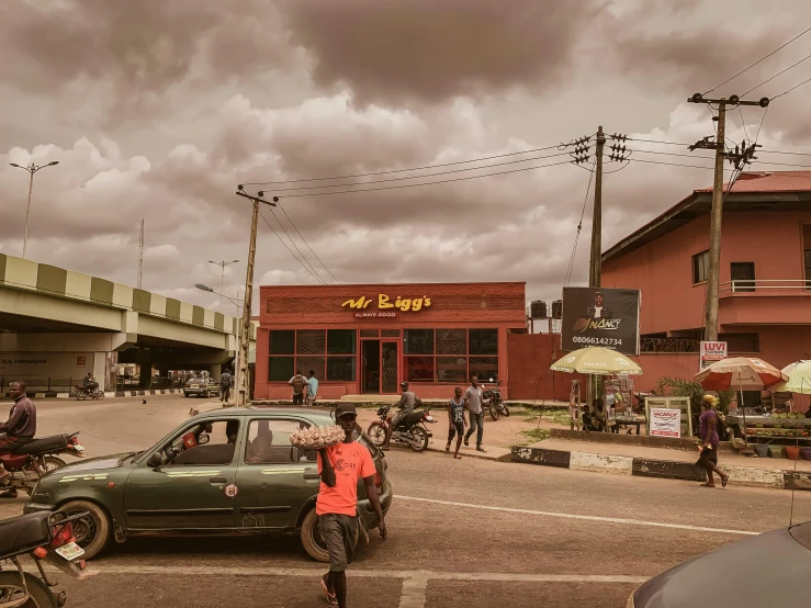 a group of people walking across a street, by Chinwe Chukwuogo-Roy, pexels contest winner, hyperrealism, red building, panoramic shot, regal fast food joint, a wooden