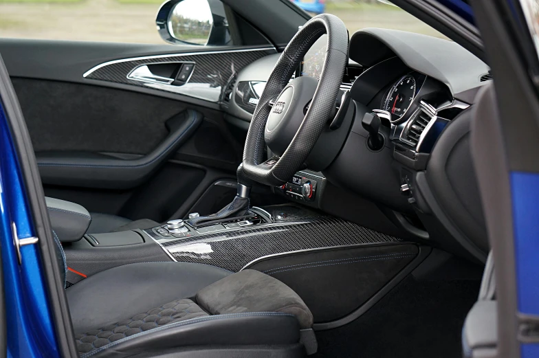 a close up of the interior of a car, pexels, chrome and carbon, square, facing left, high quality detailed