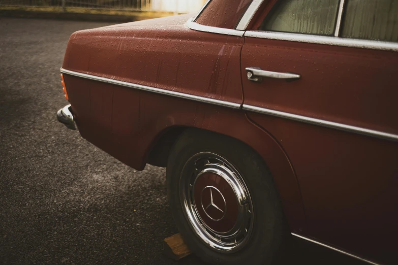 a red car parked in a parking lot, pexels contest winner, vintage - w 1 0 2 4, high body detail, half turned around, mixed art