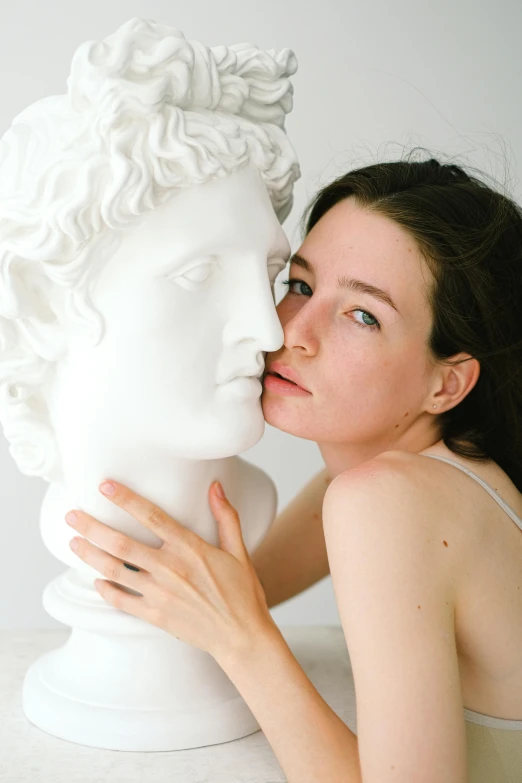 a woman kissing a statue of a woman's head, inspired by Antonio Canova, trending on unsplash, mannerism, ryan mcginley, lovingly looking at camera, marina abramovic, singularity sculpted �ー etsy