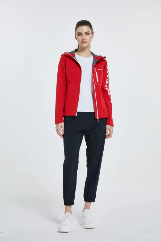 a woman wearing a red jacket and black pants, helvetica, sail, 8l, detailed product shot