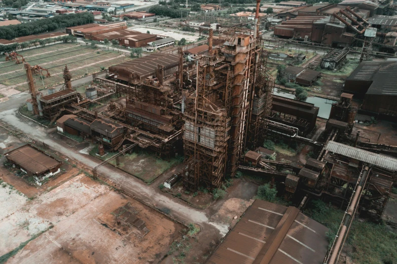 an aerial view of a large industrial plant, an album cover, inspired by Elsa Bleda, pexels contest winner, photorealism, rust, high quality material bssrdf, 15081959 21121991 01012000 4k, alessio albi