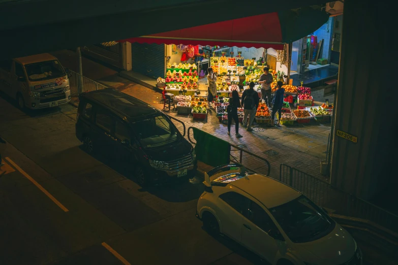 a couple of cars parked in front of a store, pexels contest winner, fresh food market people, obscured underexposed view, square, lee madgwick & liam wong