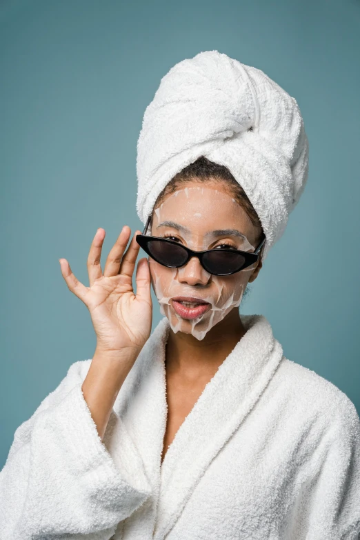 a woman with a towel wrapped around her head, trending on pexels, renaissance, wearing glack glasses, silicone skin, ashteroth, splashing