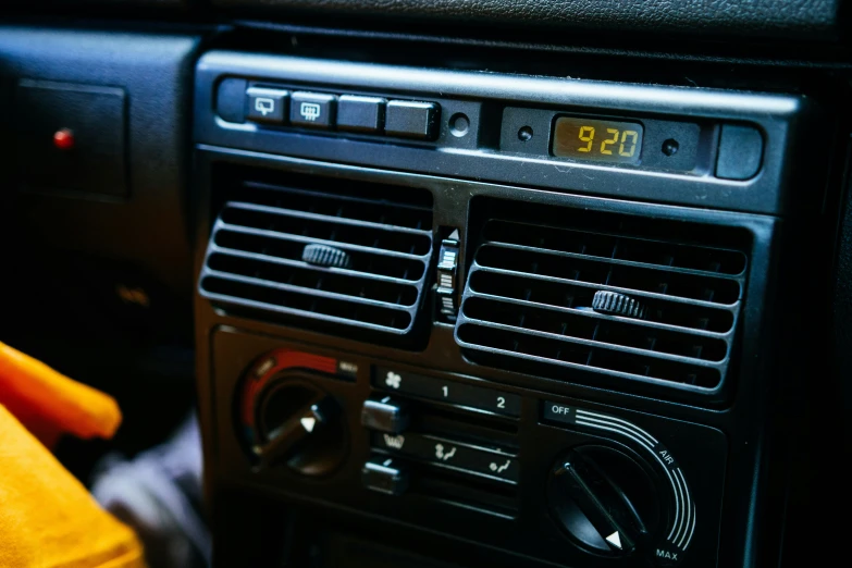 a close up of a dashboard of a car, an album cover, inspired by Elsa Bleda, unsplash, renaissance, air conditioner, square, 90s photo, 15081959 21121991 01012000 4k