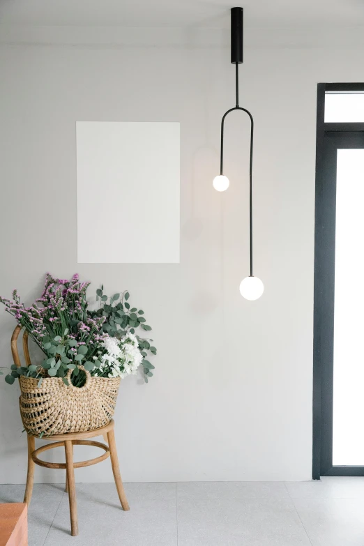 a living room with a wicker chair and a potted plant, poster art, inspired by Constantin Hansen, unsplash contest winner, light and space, glass bulbs, hung above the door, 15081959 21121991 01012000 4k, detail studio quality lighting