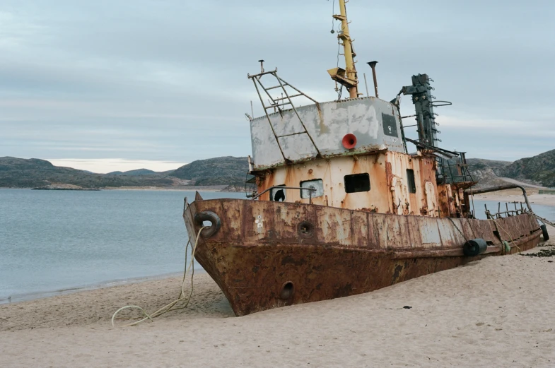 a rusty boat sitting on top of a sandy beach, by Elsa Bleda, unsplash contest winner, renaissance, ai weiwei and gregory crewdson, where a large, portrait of a slightly rusty, a cozy