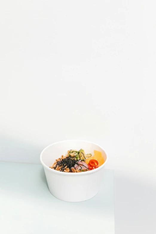 a bowl of food sitting on top of a table, minimalism, detailed product image, on a pale background, kano), nyc