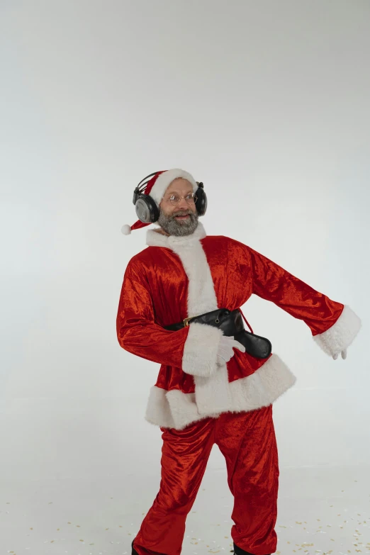 a man in a santa suit posing for a picture, an album cover, inspired by Peter de Seve, reddit, headphones dj rave, !8k!, gif, b - roll