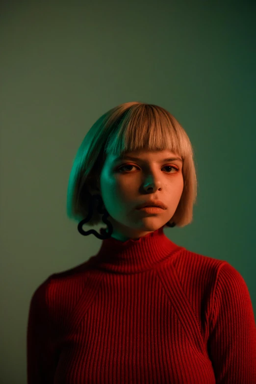 a woman with blonde hair wearing a red sweater, an album cover, inspired by Elsa Bleda, trending on pexels, sophia lillis, chrome bob haircut, humanoid portrait, very very low quality picture