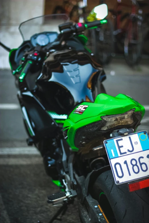 a green motorcycle parked on the side of the road, by Adam Marczyński, pexels contest winner, renaissance, tail lights, avatar image, italy, extreme detail photo quality