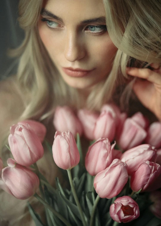 a woman holding a bouquet of pink tulips, a photorealistic painting, by Oleg Oprisco, trending on unsplash, karol bak uhd, close up of a blonde woman, eve ventrue, porcelain skin ”