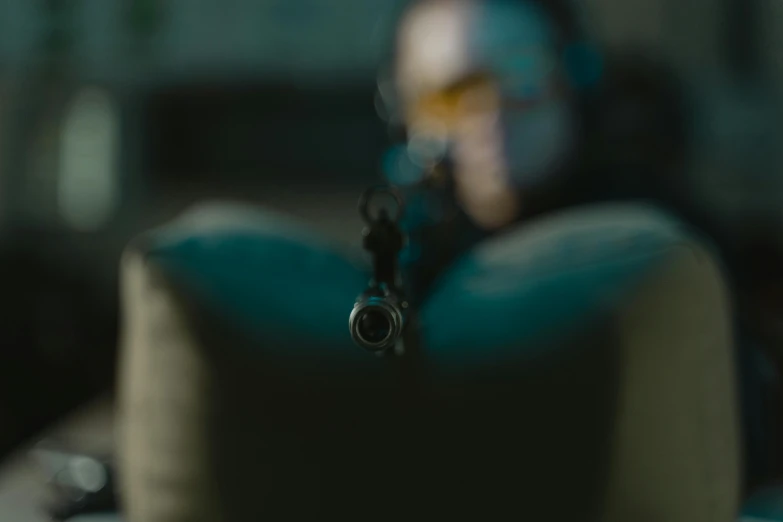 a close up of a hat on a table, pexels contest winner, realism, holding a sniper rifle, 2 0 2 1 cinematic 4 k framegrab, mid air shot, shot from 5 0 feet distance