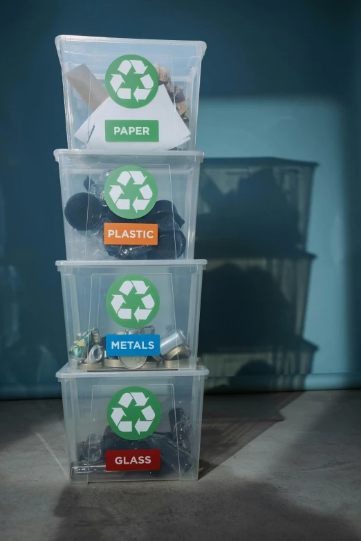 three plastic containers stacked on top of each other, by Matija Jama, reddit, plasticien, multiple stories, labels, 15081959 21121991 01012000 4k, bright natural light