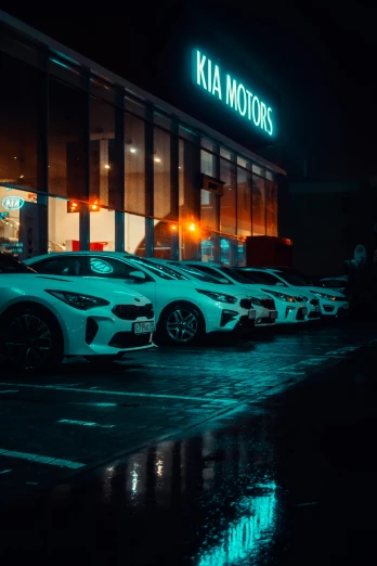 a bunch of white cars parked in front of a building, by Adam Marczyński, pexels contest winner, (((low light))), inside of an auto dealership, sports car, thumbnail