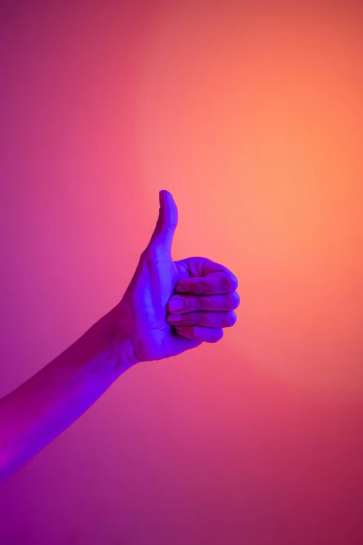 a close up of a person's hand giving a thumbs up, an album cover, by Doug Ohlson, trending on unsplash, aestheticism, colorful glow, red purple gradient, strong blue and orange colors, led color