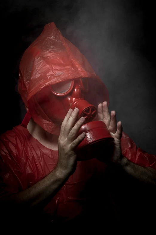 a man in a red gas mask with smoke coming out of his mouth, shutterstock contest winner, pray, leaked, red liquid, garbage