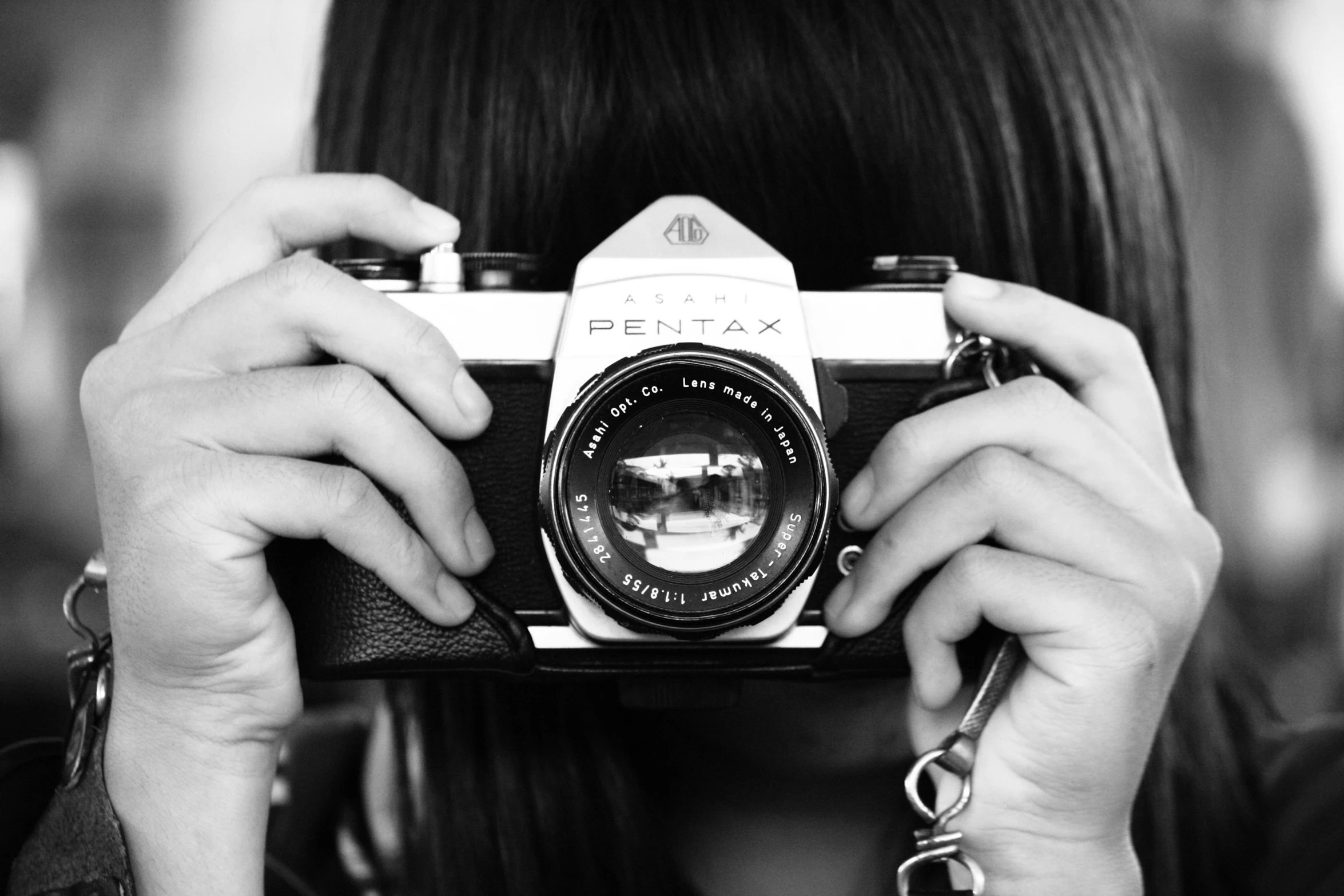 a woman taking a picture with a camera, a black and white photo, uploaded, photos, pentax 67, black & white photograph