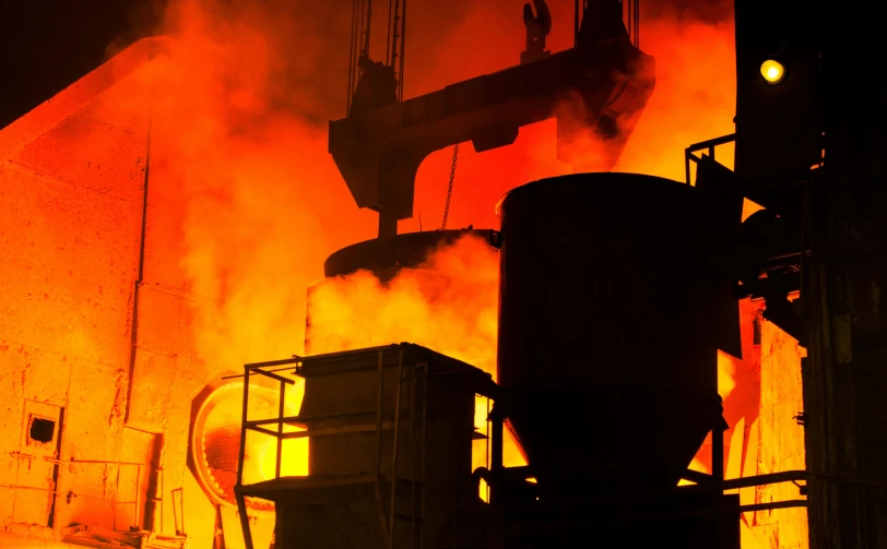 a factory with a lot of smoke coming out of it, pexels contest winner, coloured in orange fire, cast iron material, avatar image, steel