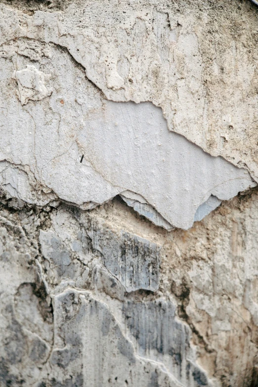 a red fire hydrant sitting on top of a cement wall, an album cover, inspired by Alberto Burri, unsplash, concrete art, tree bark texture, white clay, close-up print of fractured, light - brown wall