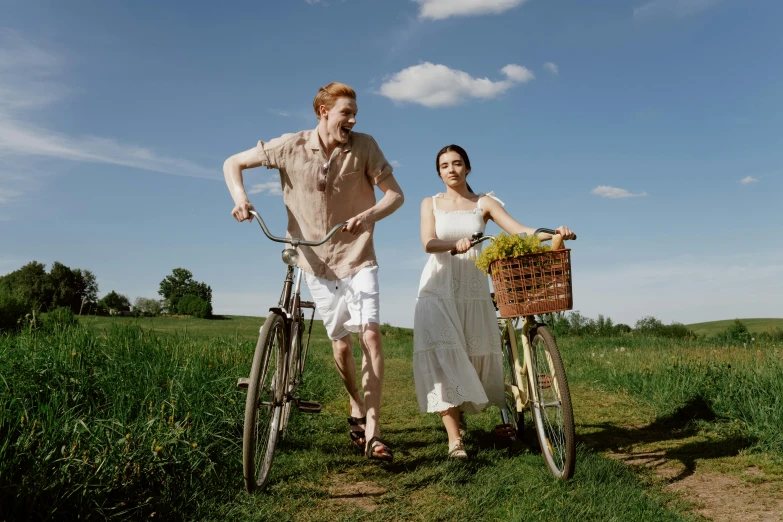 a man riding a bike next to a woman on a bike, pexels contest winner, renaissance, wearing a white sundress, picnic, max hay, promotional image