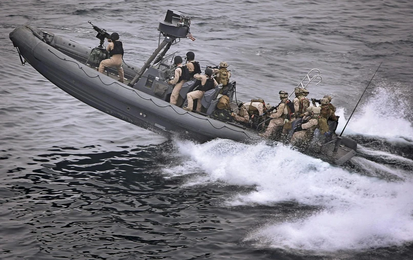 a group of people riding on the back of a boat, a digital rendering, by John Murdoch, shutterstock, hurufiyya, monkey navy seals, full colour, closeup photograph, performance