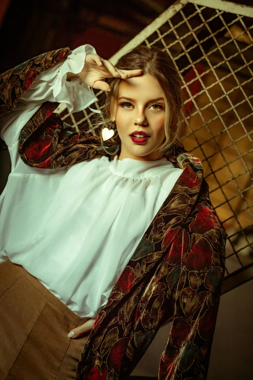 a woman in a white shirt and brown skirt, an album cover, inspired by Elsa Bleda, trending on pexels, renaissance, scarlett johansson portrait, patterned clothing, russian clothes, upscale photo